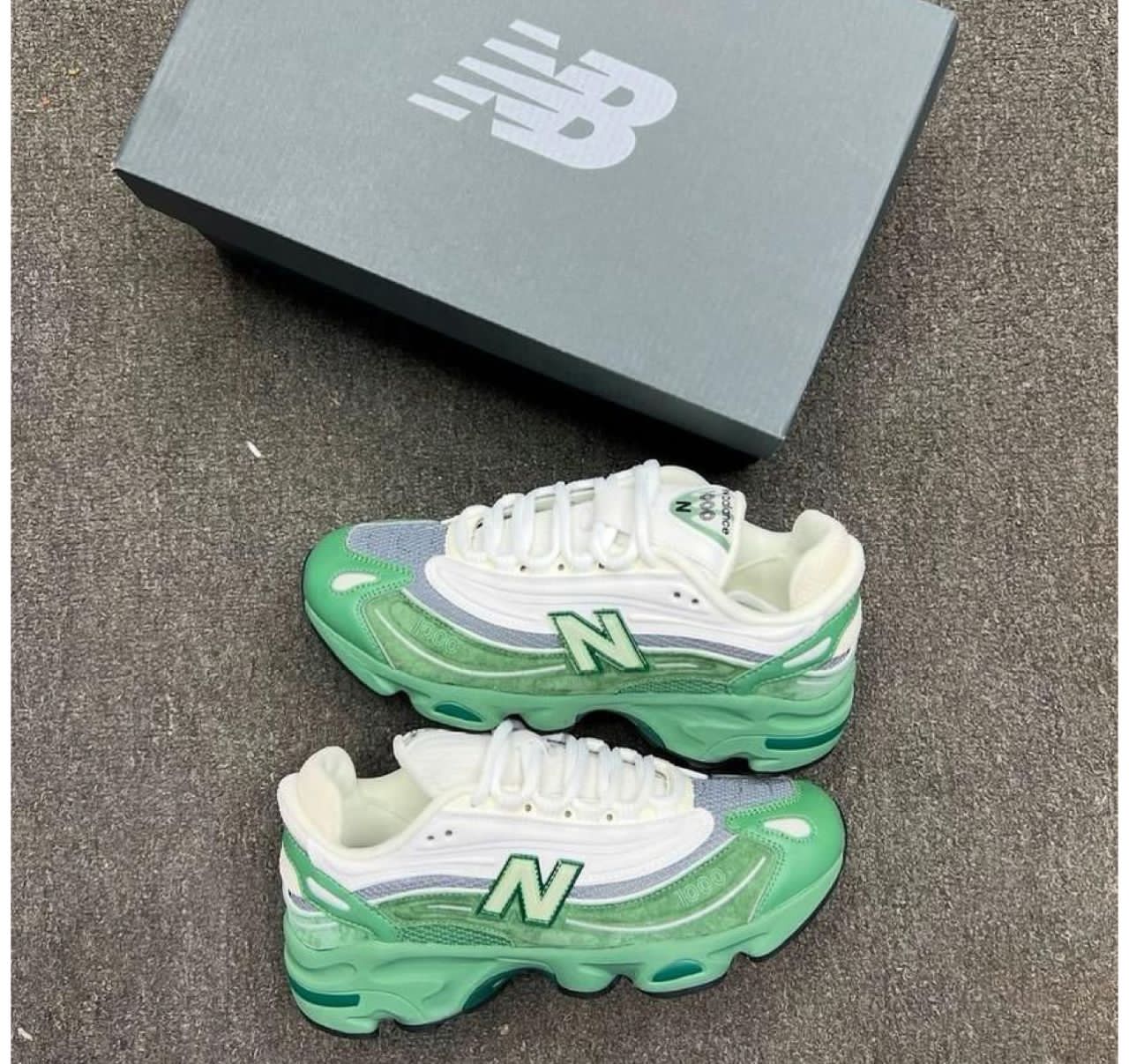 Green white New-Balance sneakers